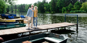 older-couple-with-boat-300x150.jpg