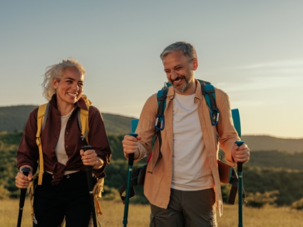 middle aged couple hiking