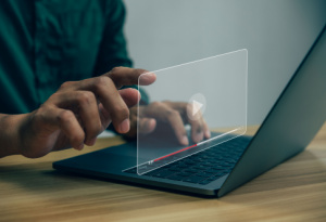 Person using laptop for YouTube demos