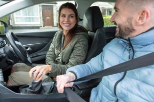 man and woman in car