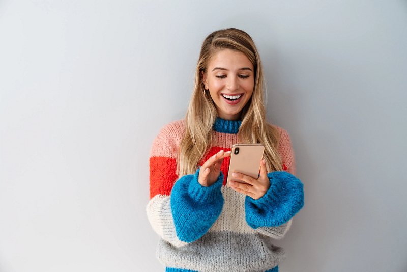 smiling girl on phone