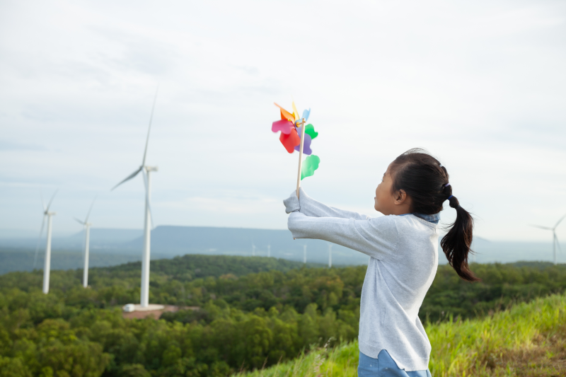 Girl holding windmill