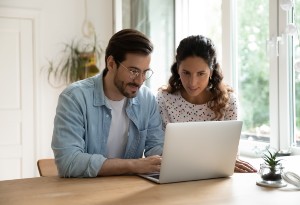 couple at home on laptop