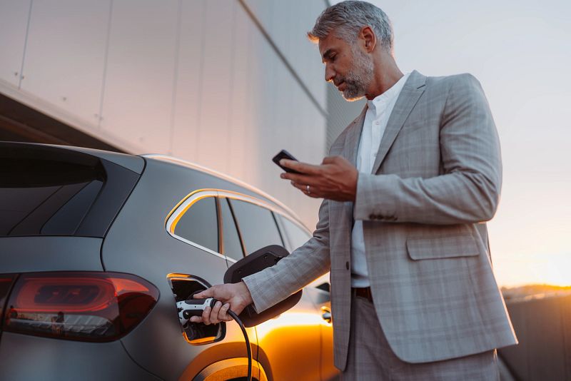 Man charging his EV